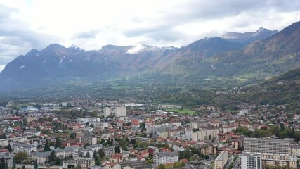 Aerial shot of the pretty old town (Conflans) overlooking Albertville, beautiful view of an old city surrounded by mountains,  View of the Conflans, the medieval city located in upper savoy, France