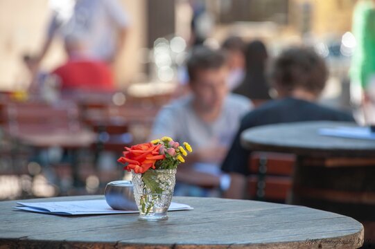 Flower Vase On Table In Cafe