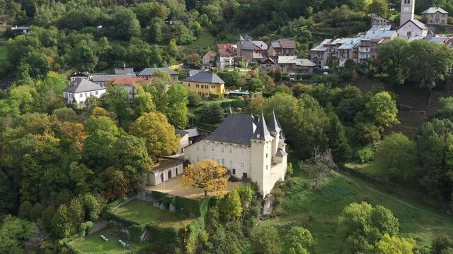 Aerial shot of the pretty old town (Conflans) overlooking Albertville, beautiful view of an old city surrounded by mountains,  View of the Conflans, the medieval city located in upper savoy, France