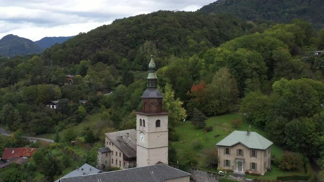 Aerial shot of the pretty old town (Conflans) overlooking Albertville, beautiful view of an old city surrounded by mountains,  View of the Conflans, the medieval city located in upper savoy, France
