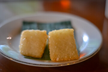 indonesian dessert on a plate. fried sticky rice