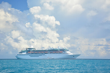 Cruise ship anchored in turquoise waters near the Bahamas in the Caribbean