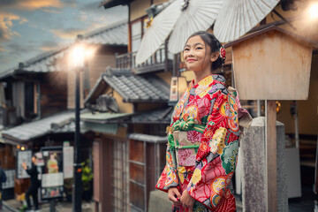 Asian woman wearing japanese traditional kimono at Yasaka Pagoda