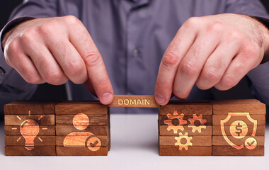 Fototapeta premium Business, Technology, Internet and network concept. Young businessman shows the word:Domain