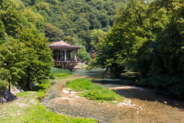 Beautiful landscape with old pavilion on the water