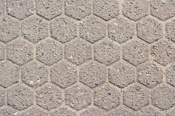 Wall of hexagon rock bricks texture background