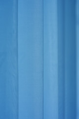 Abstract of fabric texture of blue curtain, selected focus