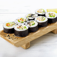 Sushi roll sushi with fish, avocado and sesame. Sushi menu. Japanese food.