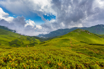 Beautiful mountain landscape with clouds at Caucasus mountains