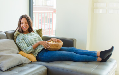 pretty woman with cheerful, carefree, rebellious attitude, joking and sticking tongue out, having...