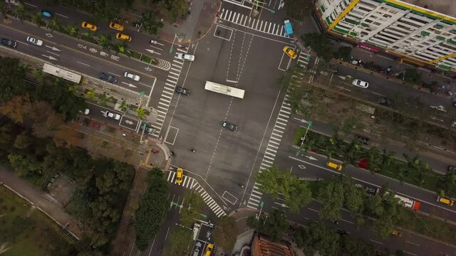 taiwan taipei city center rooftops traffic street crossroad aerial down view 4k
