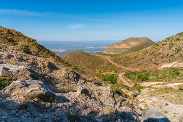 Sunset in rocky mountain desert with cactuses