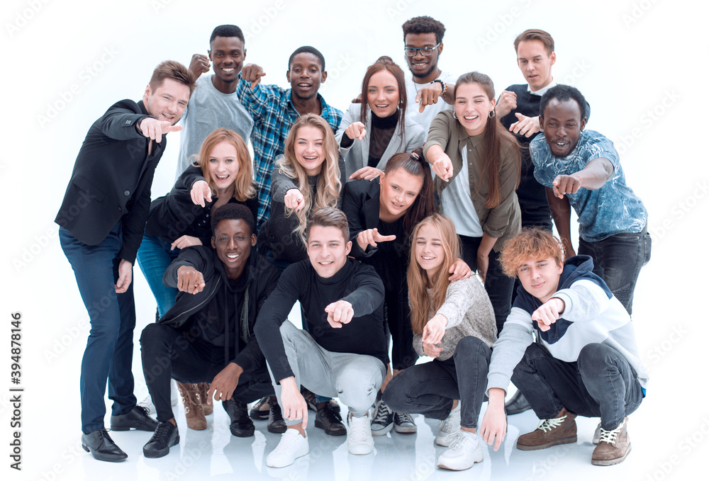 Wall mural group of happy young people standing together.