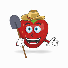 The Strawberry mascot character becomes a farmer. vector illustration