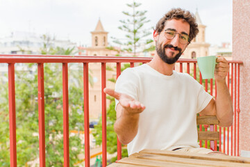 young bearded man having a coffee