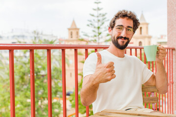 young bearded man having a coffee