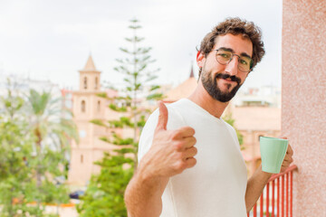 young bearded man having a coffee