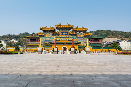 Gate of Chinese traditional royal style colorful temples in the Putuoshan mountains, Zhoushan Islands,  a renowned site in Chinese bodhimanda of the Guanyin