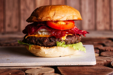 Home made hamburger with lettuce,cheese and fries potato