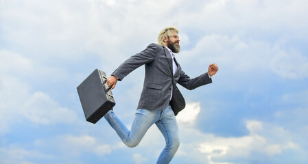 Carefree thief. Business man formal suit carries briefcase. Illegal deal business. Feel impact. Steal something. Hipster hold briefcase with bribe. Businessman run away business case. Happy worker