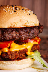 Home made hamburger with lettuce,cheese and fries potato