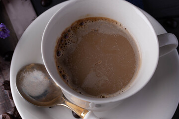 Hot coffee in white ceramic mug