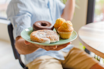 young man having breakfast at home
