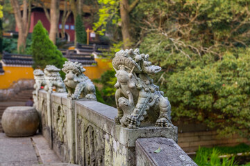 Animal statue on the handrail of the bridge to Fayu temple in the Putuoshan mountains, Zhoushan Islands,  a renowned site in Chinese bodhimanda of the bodhisattva Avalokitesvara (Guanyin)