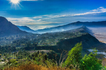 Beautiful Sunriser at Village next to volcano Bromo at sunrise time background, Cemoro lawang village at mount Bromo in Bromo tengger semeru national park, East Java, Indonesia.