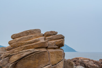 Rocks and beach in the Putuoshan, Zhoushan Islands,  a renowned site in Chinese bodhimanda of the bodhisattva Avalokitesvara (Guanyin)