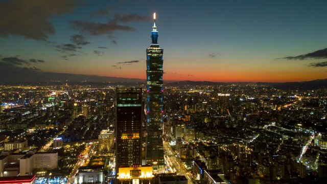 sunset night illuminated taipei tower downtown aerial panorama 4k timelapse taiwan