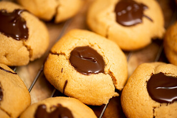 Chocolate nut biscuits being prepared for baking, food background.