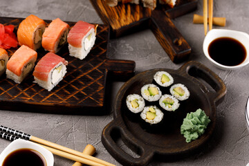 Still life with appetizing rolls. Japanese food concept. Close-up.