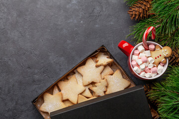 Christmas card with fir tree and cup with marshmallow