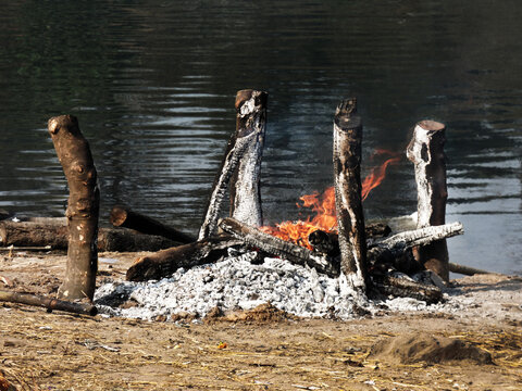 Burning Ash During Cremation At Riverbank