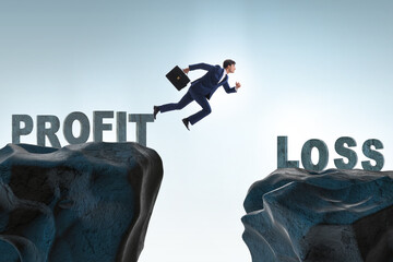 Concept of profit and loss with businessman