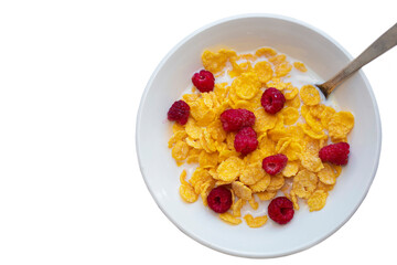 Cornflakes with raspberries on a white plate on a white background.