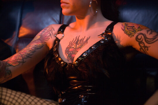 Close up of dominatrix in limousine