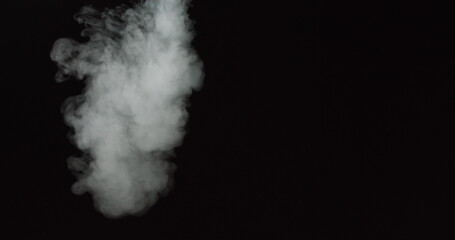 Low density smoke puff spreading concentrically outwards Gunshot smoke Shockwave smoke. Separated on pure black background, contains alpha channel.