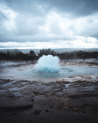 Icelandic Geysir exploding to the sky
