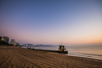 Fototapeta premium Sunrise on Nha Trang beach in Vietnam