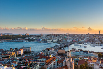 Fototapeta na wymiar Aerial view of golden horn in the strait of Bosporus under sunset from the gala tower in Istanbul, Turkey, view from the Galata tower.