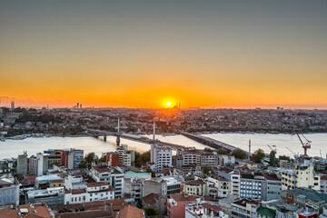 Aerial view of golden horn in the strait of Bosporus under sunset from the gala tower in Istanbul, Turkey, view from the Galata tower.