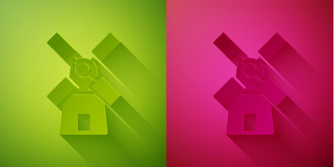 Paper cut Windmill icon isolated on green and pink background. Paper art style. Vector.