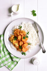 Vegan cauliflower curry with rice. Top view with copy space.
