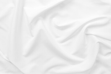 Obraz premium Abstract white fabric texture background. Cloth soft wave. Creases of satin. silk and cotton.