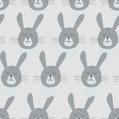 Obraz premium Seamless pattern with cute rabbit head. Decorative wallpaper for the nursery in the Scandinavian style. Vector. Suitable for children's clothing, interior design, packaging, printing.