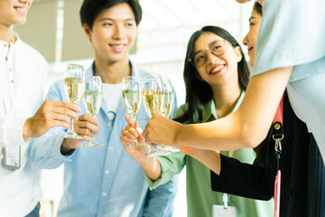 Everyone is drinking champagne and congratulating each other on the new year