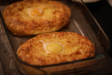 hot khachapuri, cheese pie, Georgian dish, homemade cakes