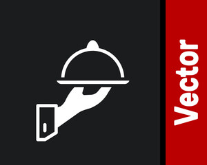 White Covered with a tray of food icon isolated on black background. Tray and lid sign. Restaurant cloche with lid. Vector.